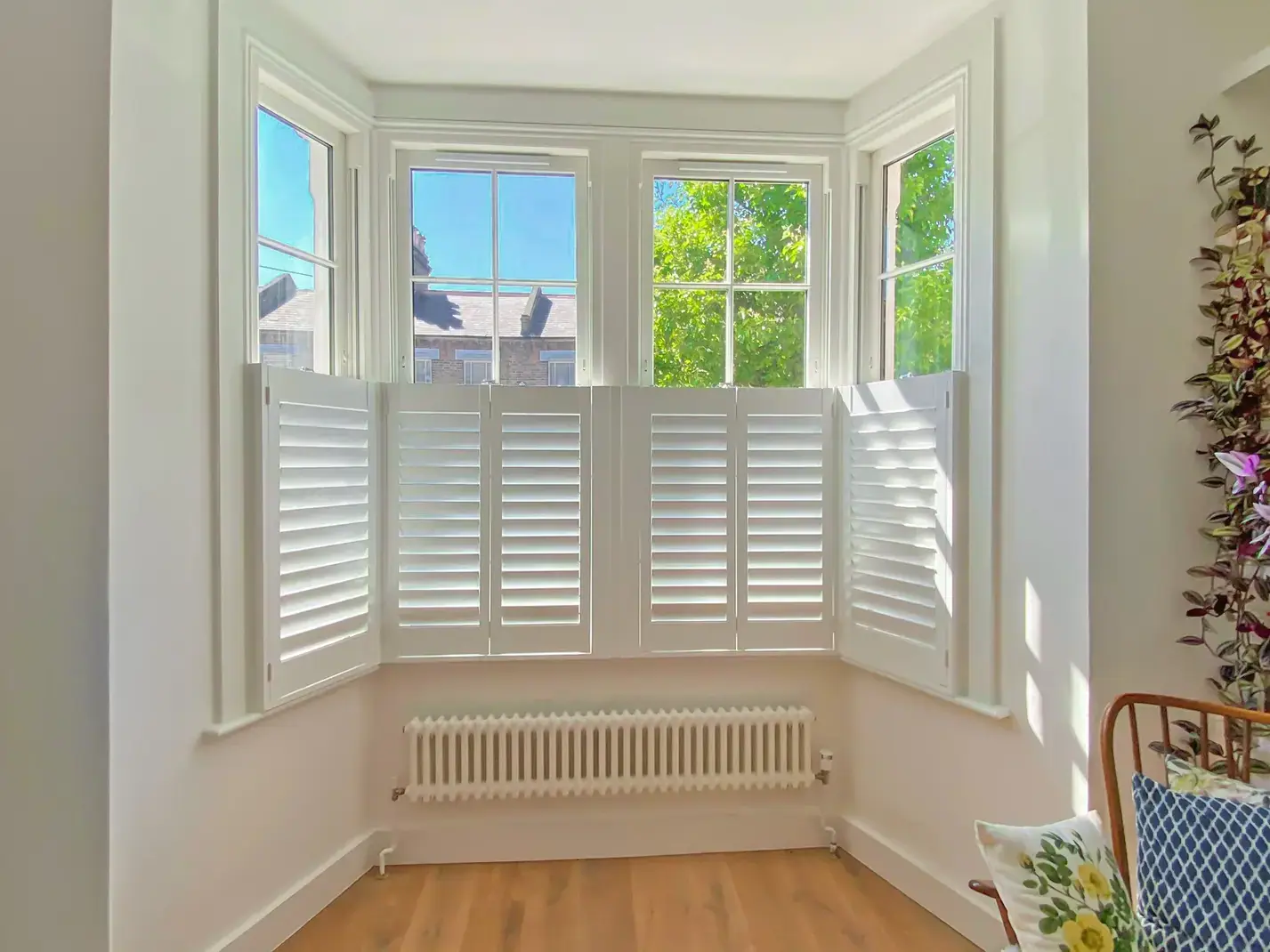 Café Style shutters in a bay window