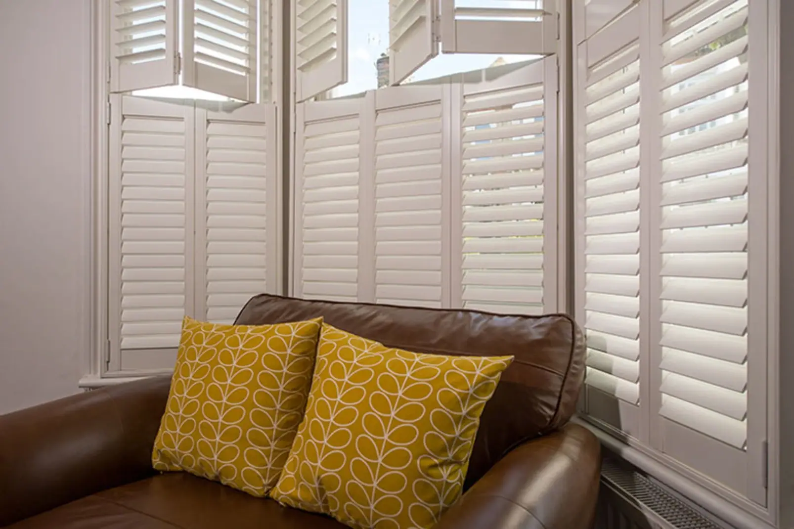 Tier-on-Tier shutters with the top tier folded open
